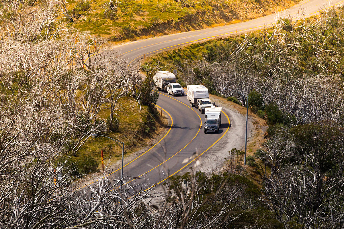 A convoy-from-three-caravans-that-are-being-towed-on-the-Great-Alpine-Road