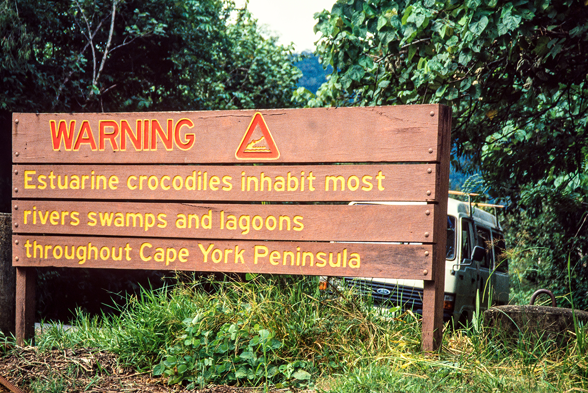A signpost warning of the dangers of large saltwater crocodiles