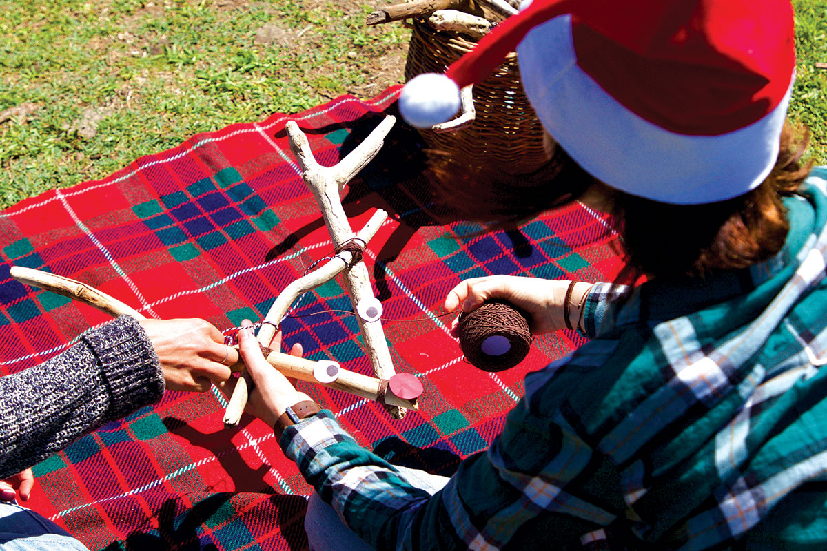 People-making-Rudolph-at-a-campsite